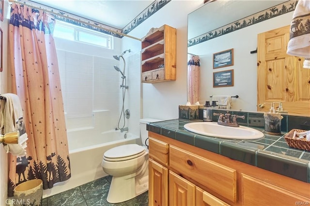 full bathroom featuring toilet, shower / bath combo with shower curtain, and vanity