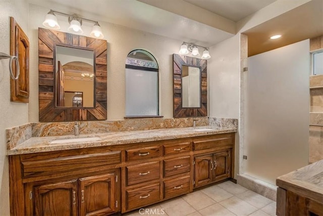 bathroom with vanity and tile patterned floors