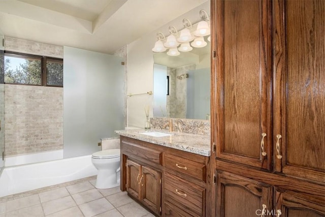 full bathroom with tiled shower / bath, vanity, toilet, and tile patterned flooring