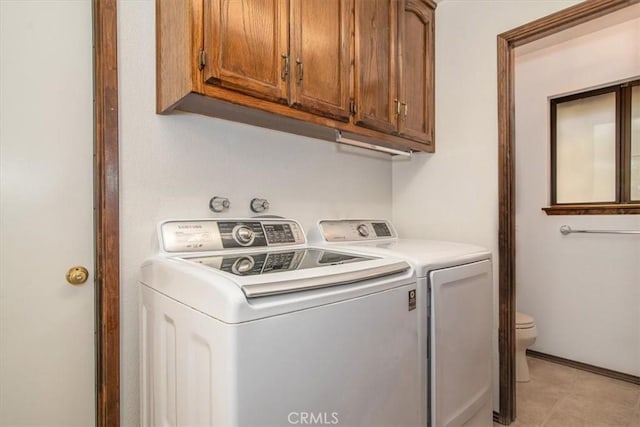 laundry room featuring separate washer and dryer