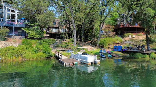 view of dock with a water view