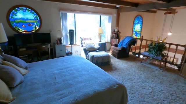 carpeted bedroom with beam ceiling