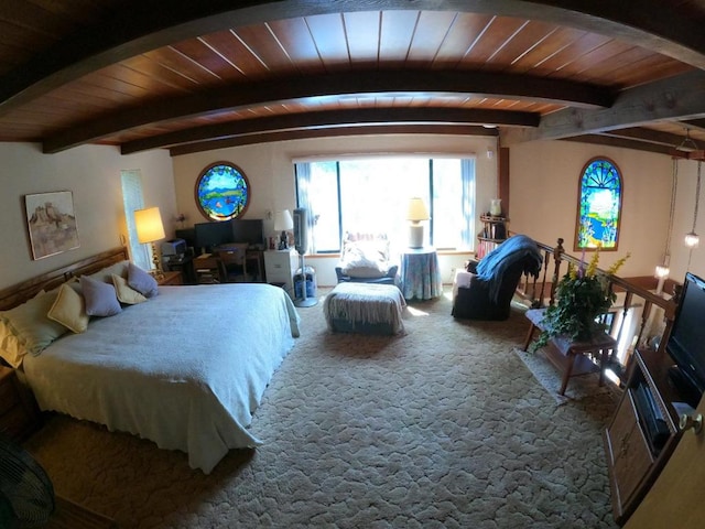 bedroom with wood ceiling, beam ceiling, and carpet flooring