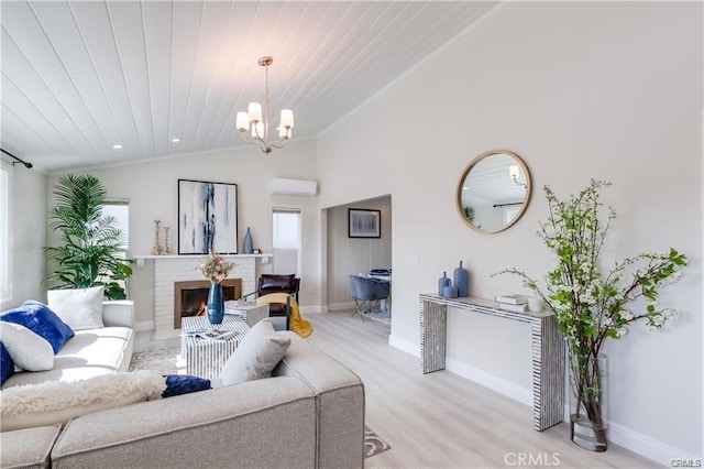 living room with lofted ceiling, a chandelier, a fireplace, wooden ceiling, and light wood-type flooring