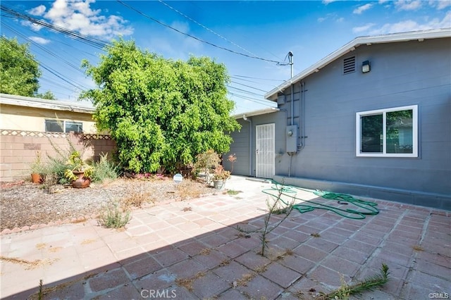 view of patio with fence