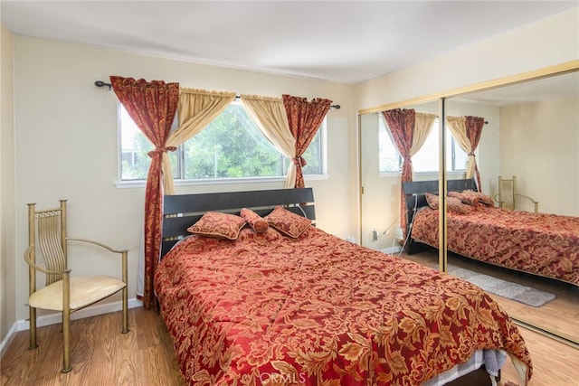 bedroom featuring hardwood / wood-style flooring