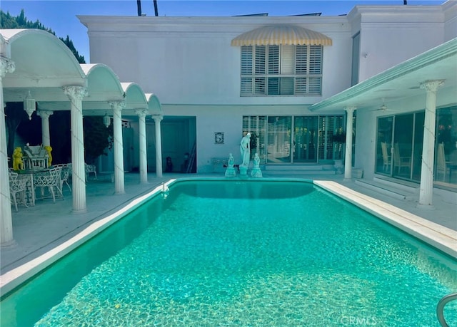 730 Santiago Ave, Long Beach, CA 90804 - swimming pool featuring a patio and a ceiling fan