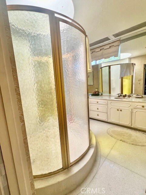 730 Santiago Ave, Long Beach, CA 90804 - full bathroom featuring a shower stall and vanity