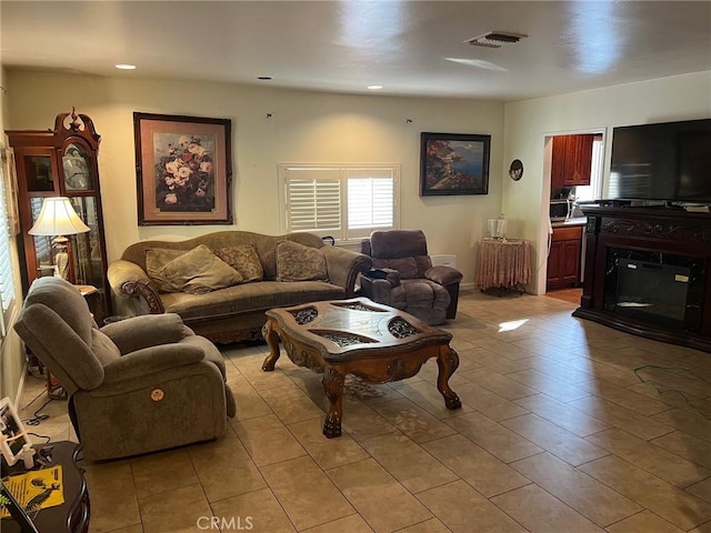 living room with light tile patterned floors