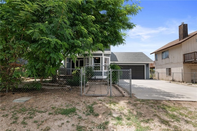 view of front of property featuring a garage