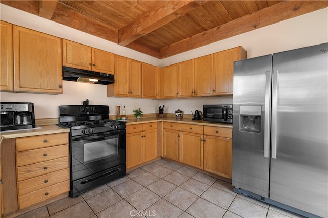 kitchen with beam ceiling, wood ceiling, stainless steel appliances, and light tile patterned floors