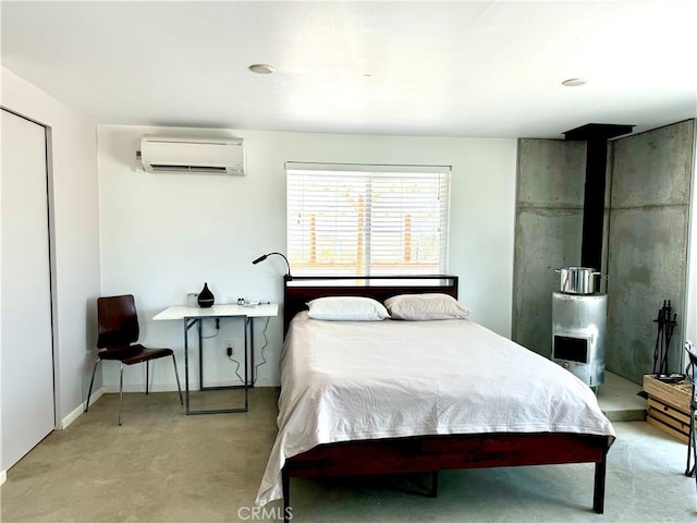 bedroom with a wall mounted air conditioner