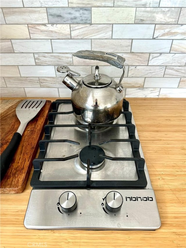 interior details with stainless steel cooktop