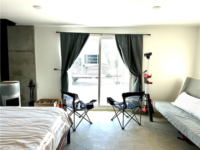 bedroom with concrete flooring