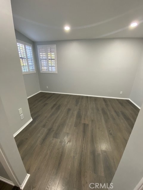 empty room featuring dark hardwood / wood-style floors