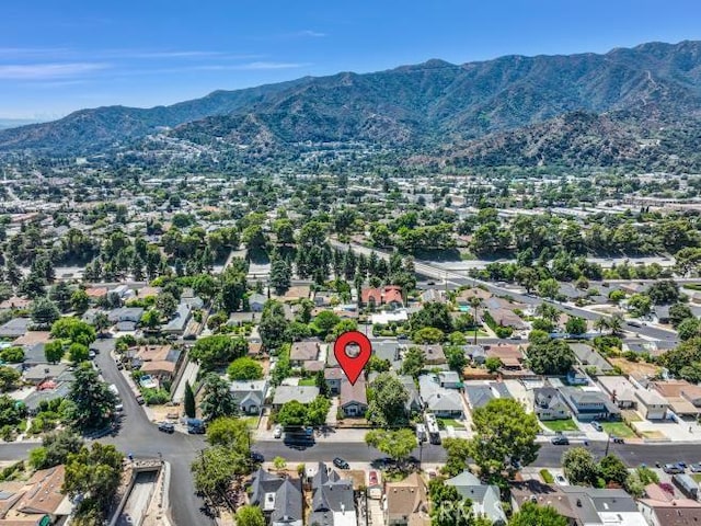 drone / aerial view with a residential view and a mountain view