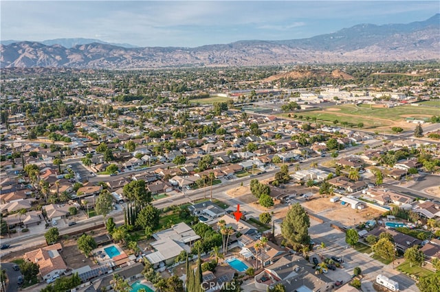 drone / aerial view featuring a mountain view