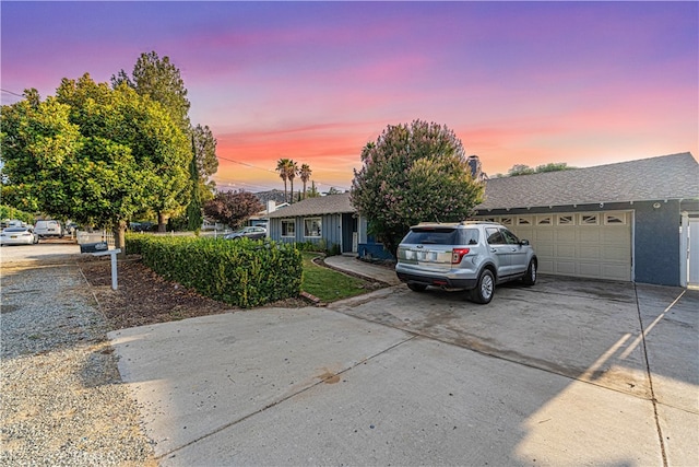 view of front of property with a garage