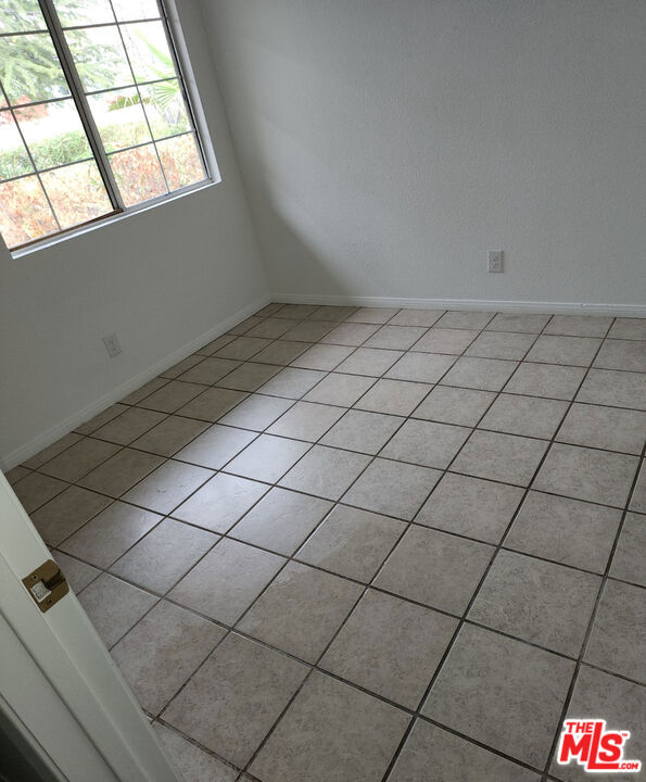 view of tiled empty room