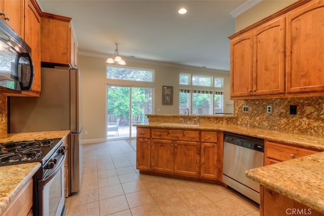 kitchen with light tile patterned flooring, sink, decorative backsplash, stainless steel appliances, and crown molding