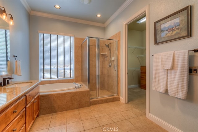 bathroom with vanity, separate shower and tub, and plenty of natural light