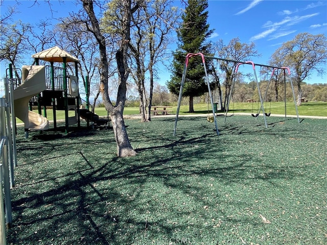 view of play area featuring a lawn