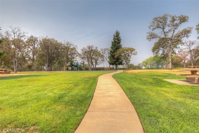 view of community with a lawn