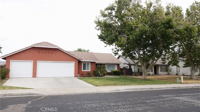 ranch-style house with a front lawn and a garage