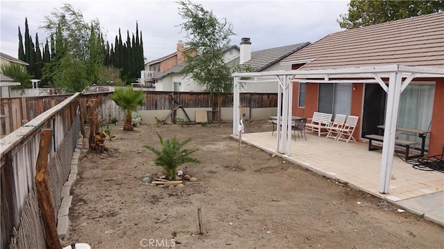 view of yard featuring a patio and a pergola