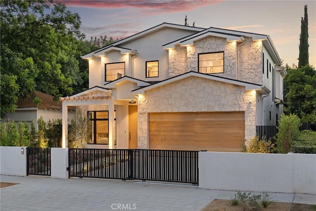 view of front of home featuring a garage