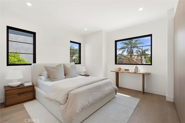 bedroom featuring light hardwood / wood-style floors