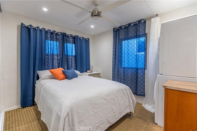 carpeted bedroom featuring ceiling fan