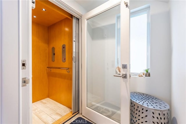 bathroom featuring elevator