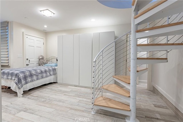 bedroom featuring light wood-type flooring