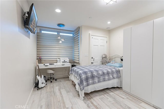 bedroom featuring light hardwood / wood-style flooring