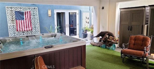 interior space featuring french doors and a hot tub