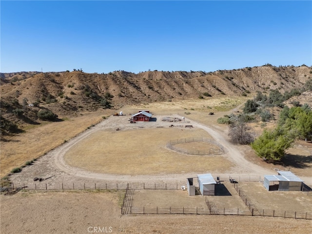 birds eye view of property featuring a rural view