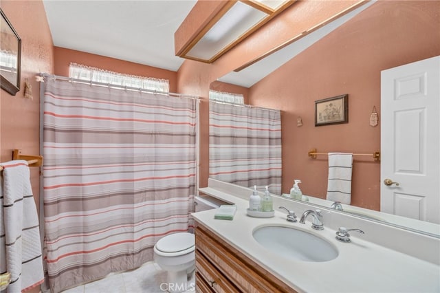 full bath with tile patterned floors, vanity, curtained shower, and toilet