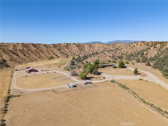 aerial view with a mountain view and a rural view