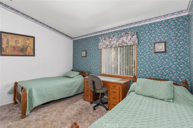 bedroom featuring light carpet