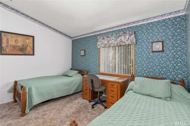 carpeted bedroom with wallpapered walls