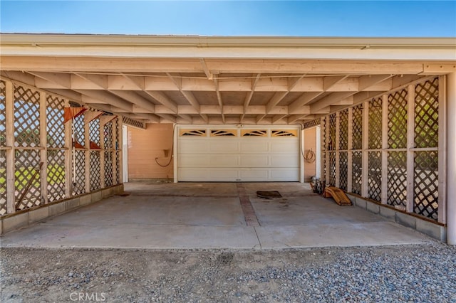 garage featuring a carport