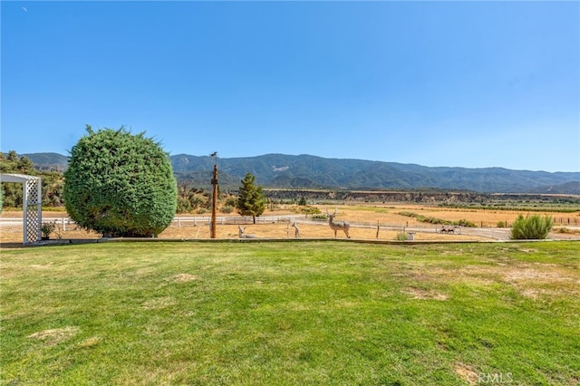 view of mountain feature with a rural view