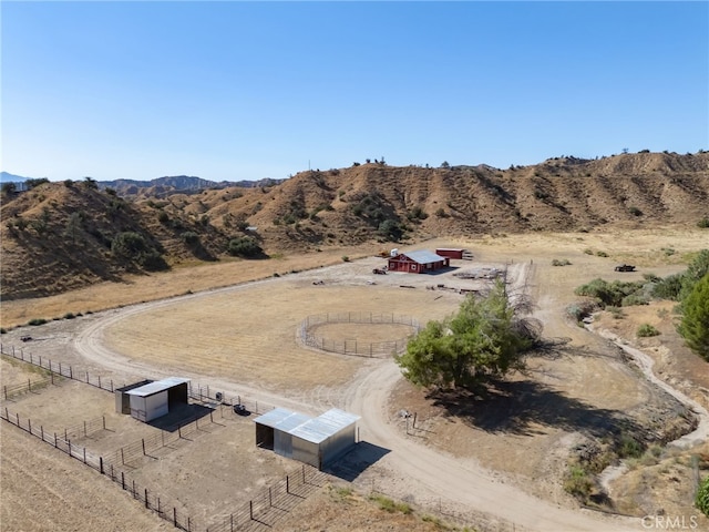 bird's eye view with a mountain view and a rural view