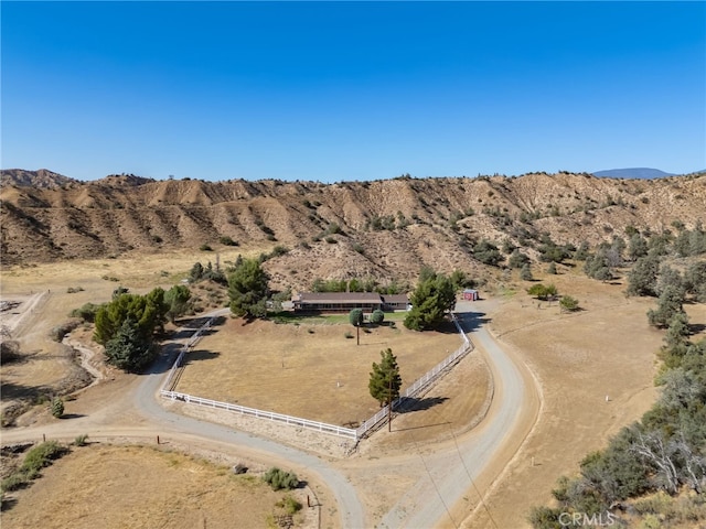 bird's eye view with a mountain view and a rural view