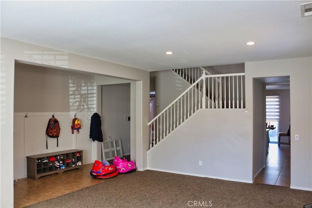 recreation room with tile patterned flooring, visible vents, baseboards, carpet floors, and recessed lighting