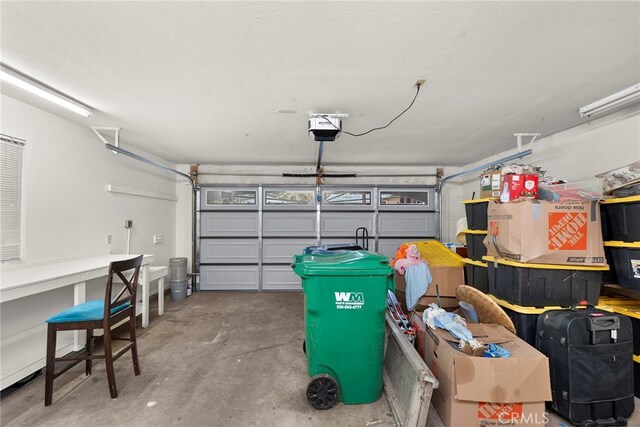 garage featuring a garage door opener