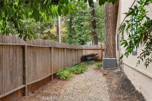 view of yard with central AC unit