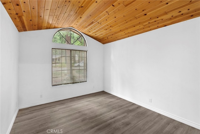 unfurnished room featuring vaulted ceiling, hardwood / wood-style floors, and wooden ceiling