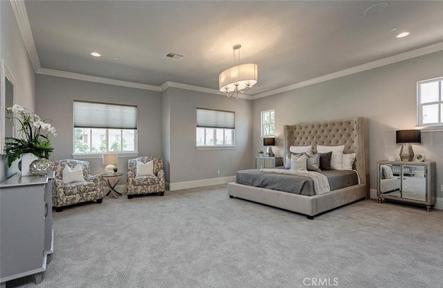 bedroom featuring carpet, multiple windows, and crown molding